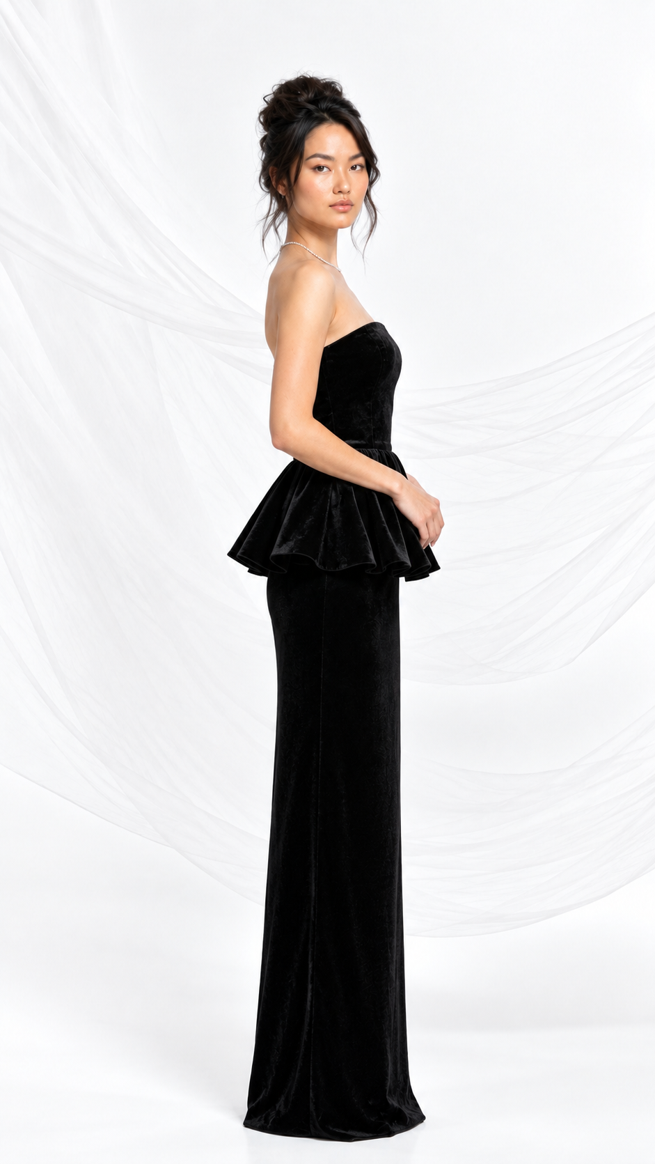 Floor-length black velvet gown