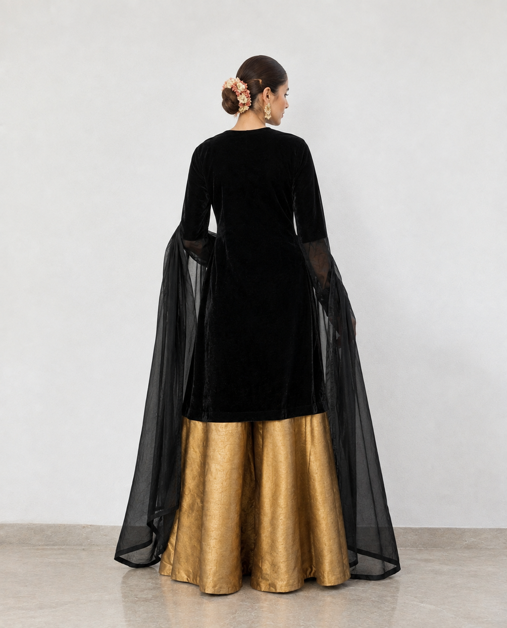 A sophisticated black velvet kurta