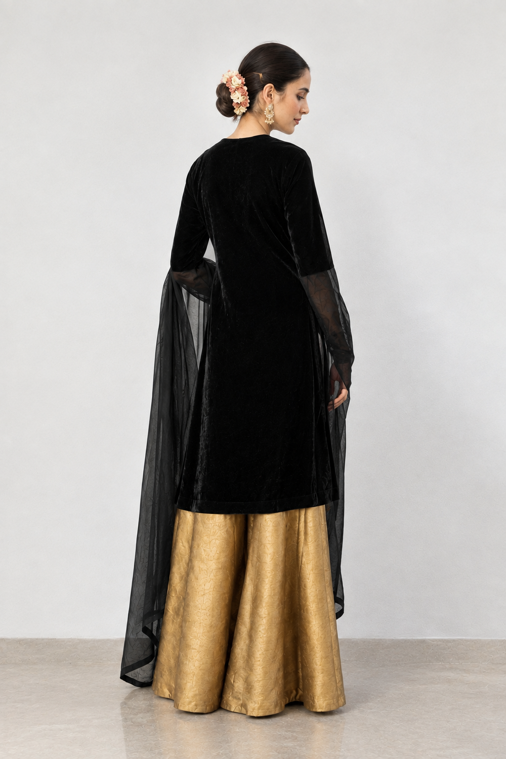 A sophisticated black velvet kurta